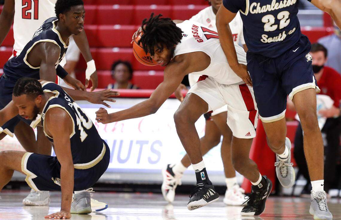 N.C. State’s Jaylon Gibson (11) takes the ball upcourt during the second half of N.C. State’s 95-61 victory over Charleston Southern in the Wolfpack Invitational at Reynolds Coliseum in Raleigh, N.C., Wednesday, Nov. 25, 2020.
