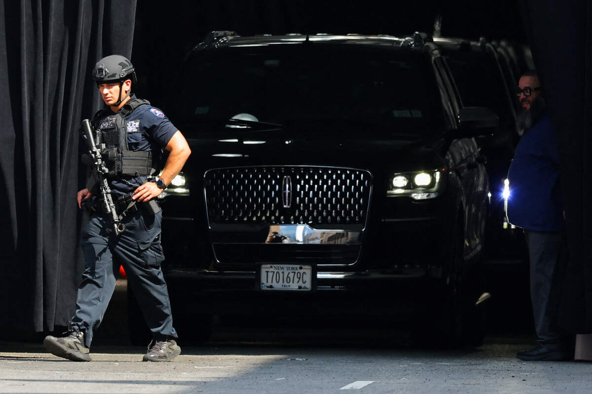 A police officer walks as guests arrive at Madison Square Garden, the venue for the reported wedding celebrations of Taylor Swift and Travis Kelce, in New York, U.S., July 3, 2026.