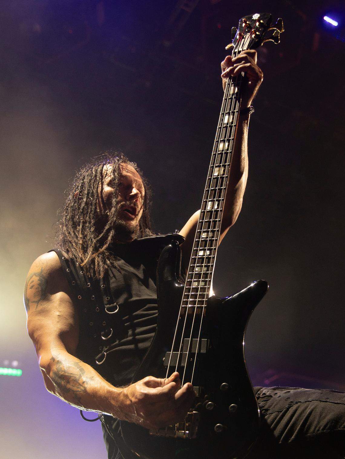 Disturbed bassist John Moyer in action as the band performs at Coastal Credit Union Music Park at Walnut Creek, Wednesday night, Sept. 6, 2023.
