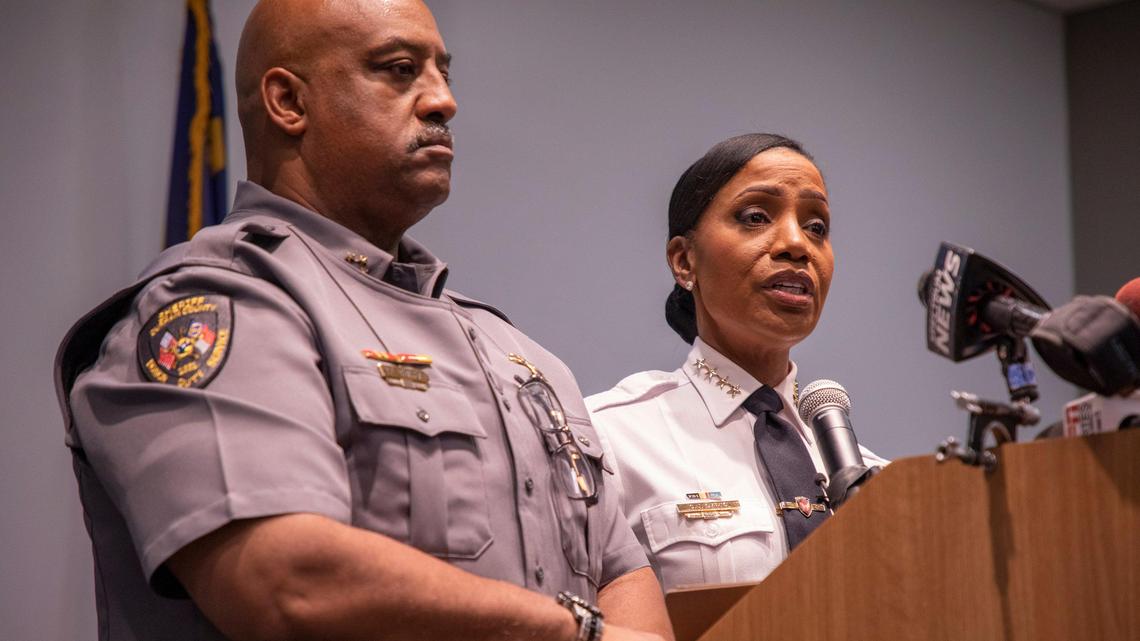 Durham County Sheriff Clarence Birkhead, left, and then Durham Police Chief C.J. Davis, stand together to answer questions after a press conference held by a coalition of local law enforcement agencies to address an increase in violent crime. at Durham Police Headquarters.