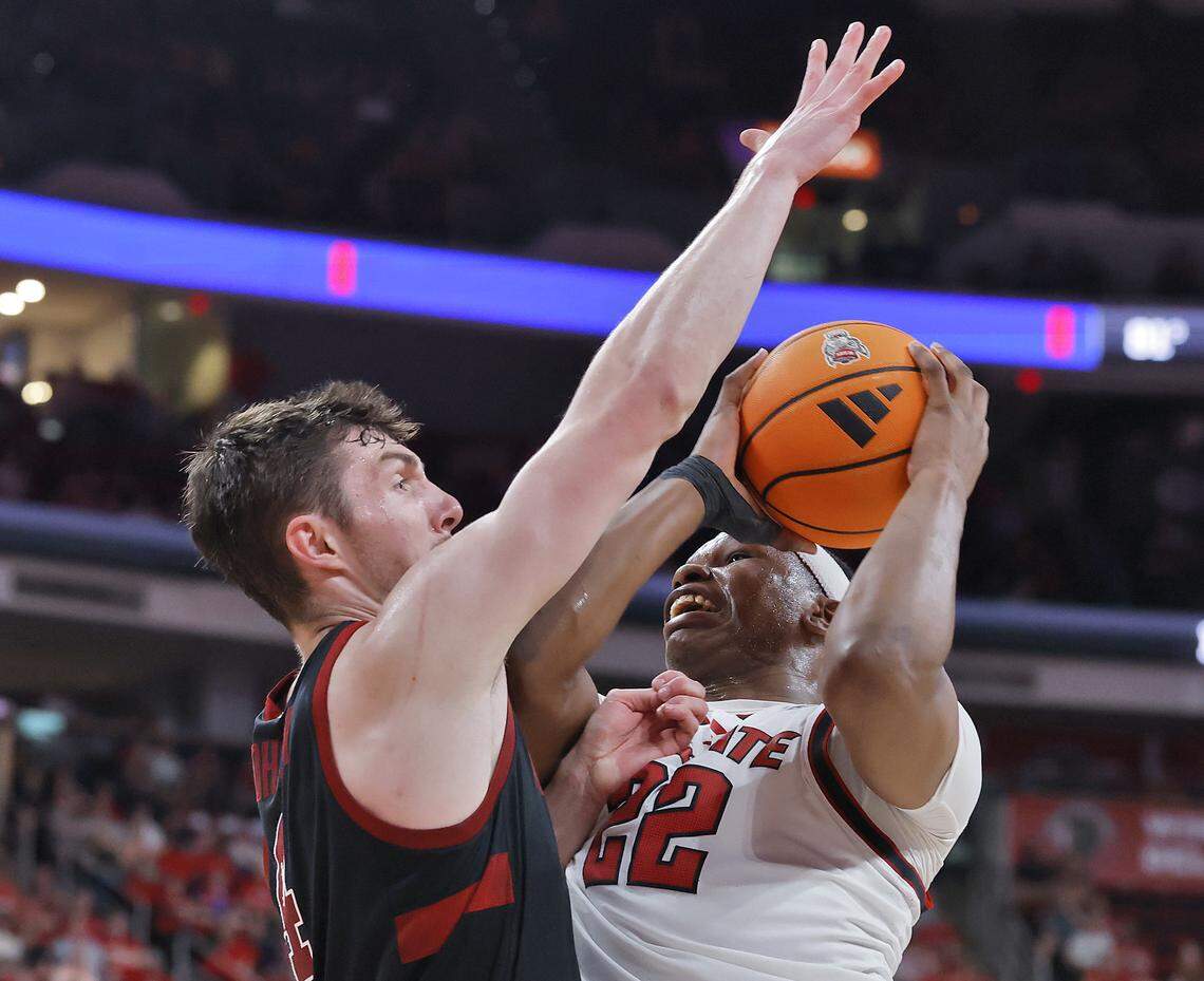 N.C. State's Ven-Allen Lubin looks to shoot over Stanford's AJ Rohosy during the second half of the Wolfpack’s 85-84 loss on Saturday, March 7, 2026, at Lenovo Center in Raleigh, N.C.
