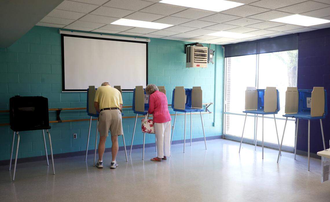 Voters vote at Millbrook Exchange Community Center in Raleigh, North Carolina, during the primary elections Tuesday, May 8, 2018.