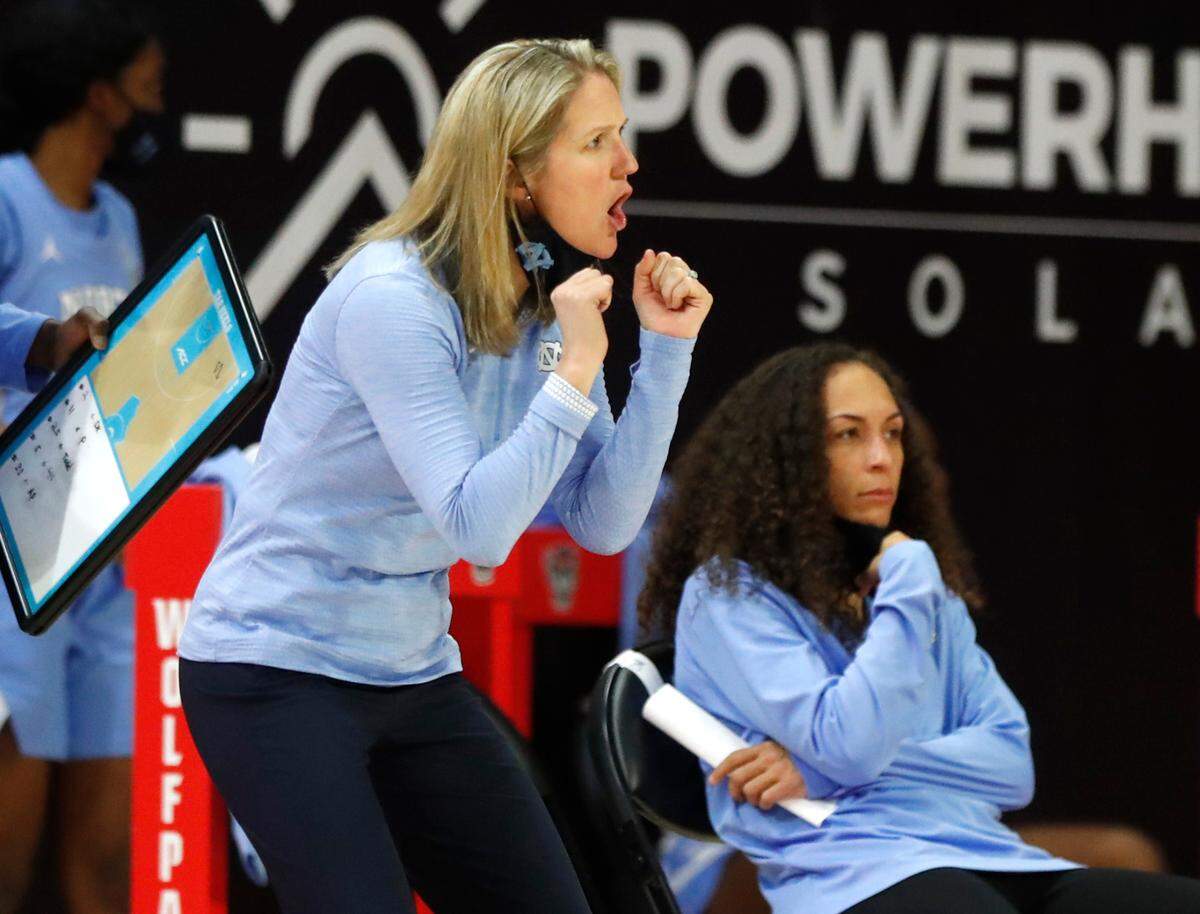 North Carolina head coach Courtney Banghart encourages her team during the second half of N.C. State’s 82-63 victory over UNC in the annual Play4Kay game at Reynolds Coliseum in Raleigh, N.C., Sunday, February 21, 2021.