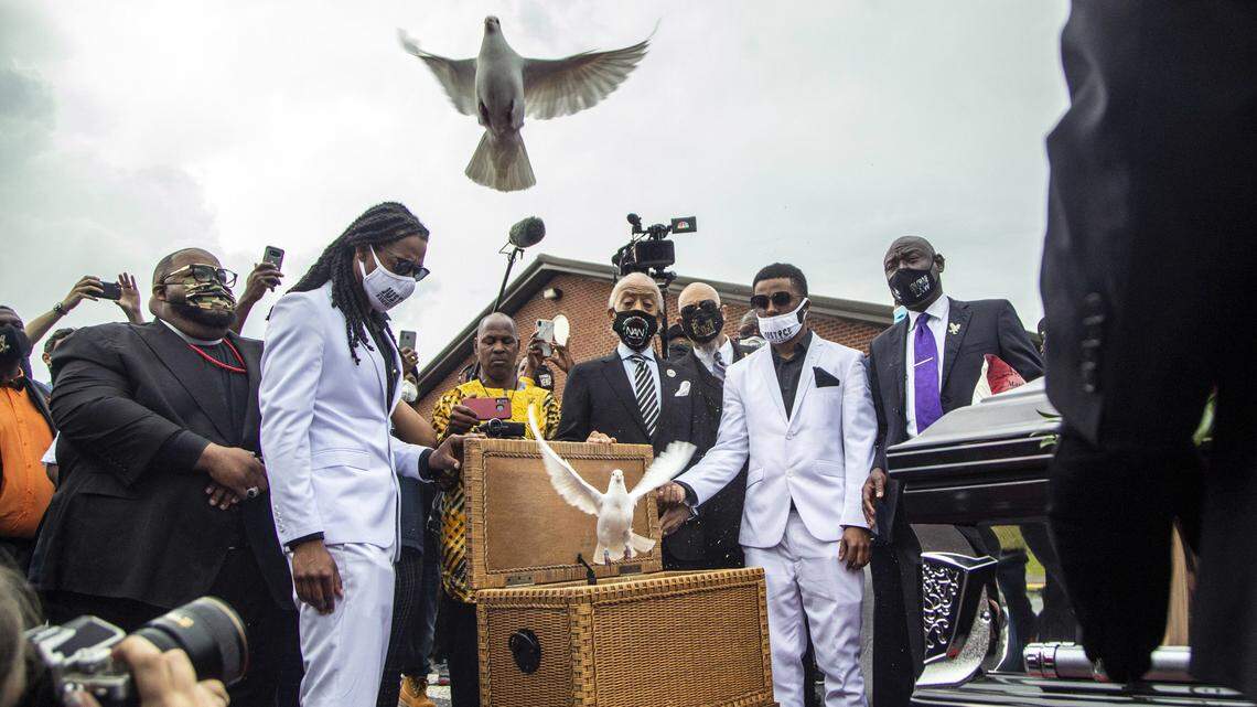 Andrew Brown Jr.ís sons Kahlil Ferebee, left, and Jha’rod Ferebee release doves following the funeral of Andrew Brown Jr. at the Fountain of Life Church in Elizabeth City, NC Monday, May 3, 2021. Brown was shot and killed by Pasqoutank County Sheriff deputies in April.