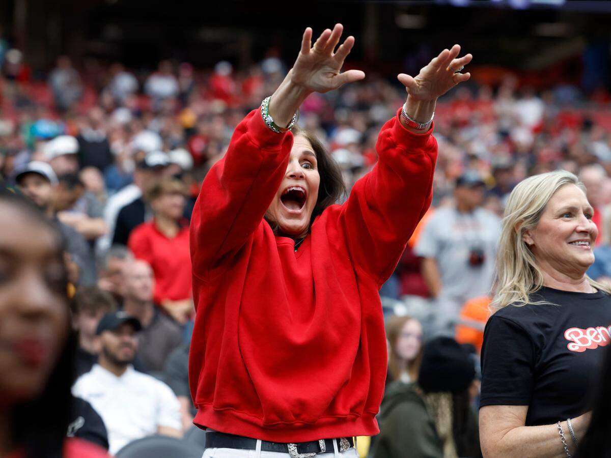 Daryl Middlebrooks, mom of N.C. State’s Ben Middlebrooks, yells to him as the Wolfpack take the court at the start of their practice at State Farm Stadium in Glendale, Ariz., Friday, April 5, 2024. The Wolfpack will face Purdue in the NCAA Tournament national semifinals Saturday.