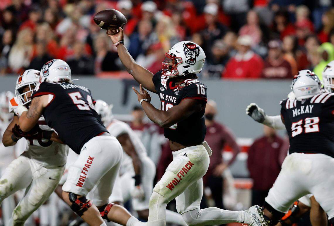 N.C. State quarterback MJ Morris (16) passes during the second half of N.C. State’s 22-21 victory over Virginia Tech at Carter-Finley Stadium in Raleigh, N.C., Thursday, Oct. 27, 2022.