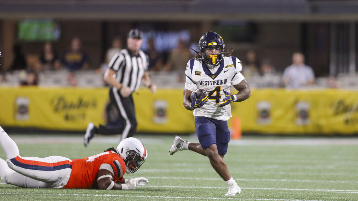 West Virginia football rolls over No. 25 Virginia behind QB Michael Hawkins
