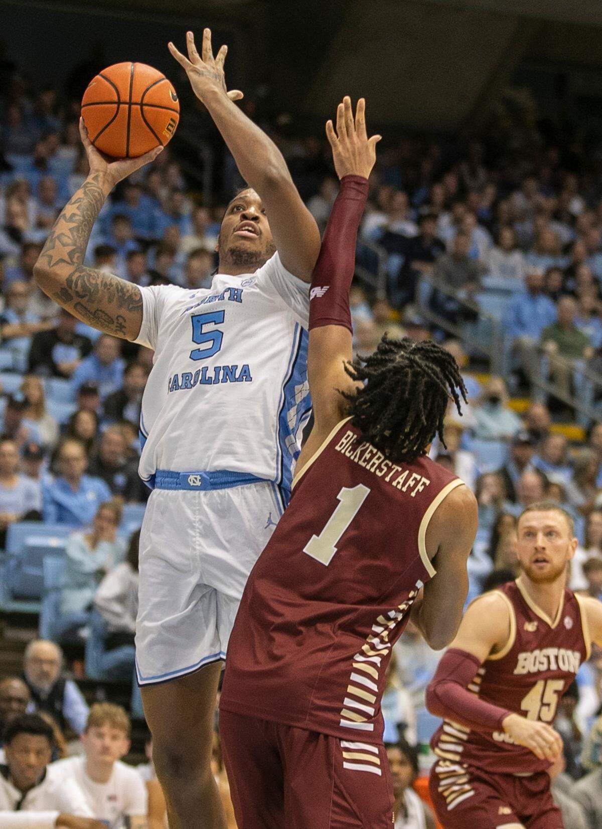 North Carolina’s Armando Bacot (5) puts up a shot against Boston College’s T.J. Bickerstaff (1) during the second half on Tuesday, January 17, 2023 at the Smith Center in Chapel Hill, N.C. Bacot lead all scores with 20 point in the Tar Heels’ 72-64 victory.