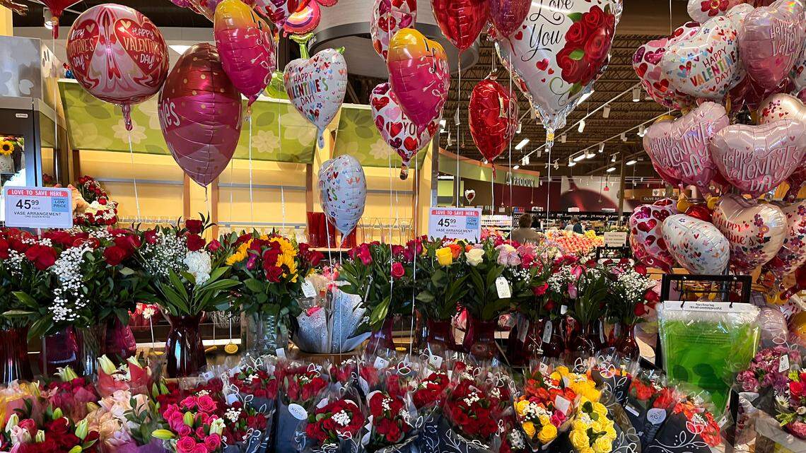 Balloons and flower bouquets await the desperate last-minute Valentine’s Day shopper at Publix in North Raleigh.