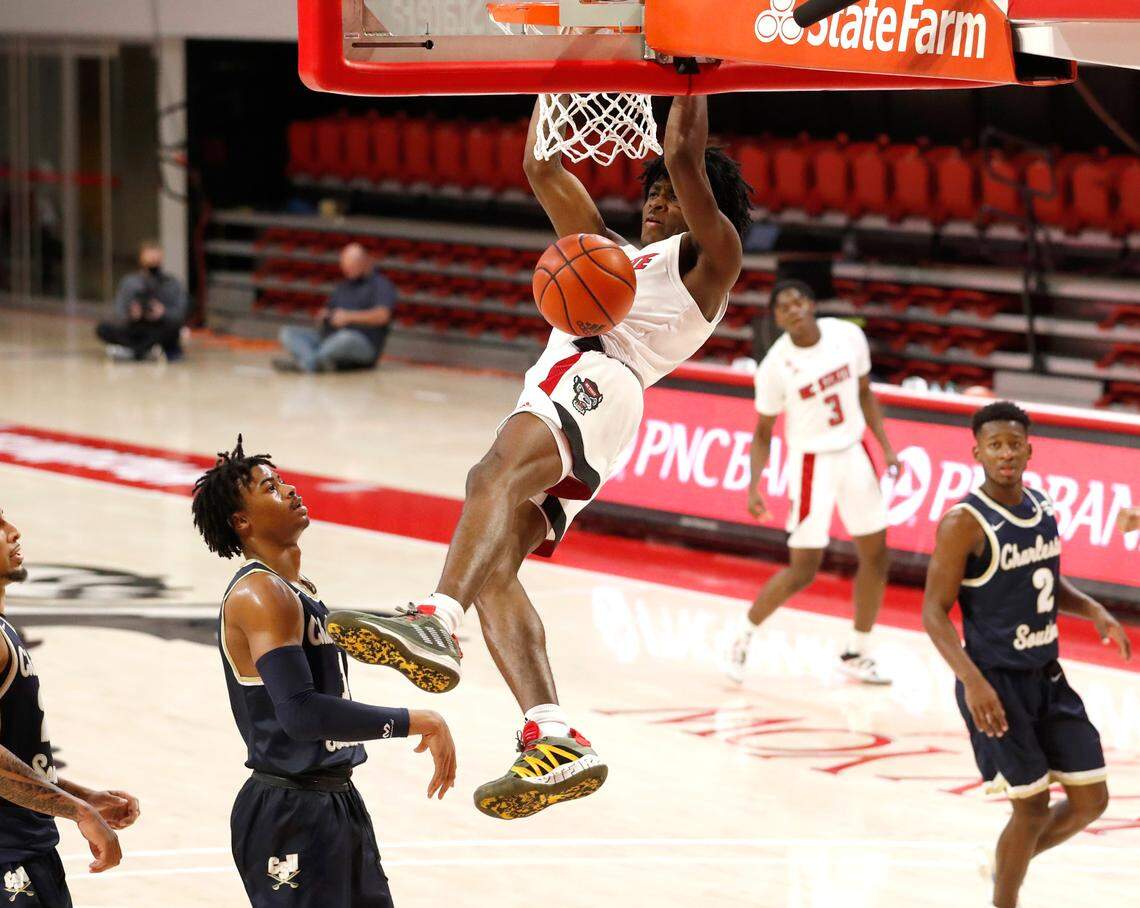N.C. State’s Dereon Seabron (1) slams in two during the second half of N.C. State’s 95-61 victory over Charleston Southern in the Wolfpack Invitational at Reynolds Coliseum in Raleigh, N.C., Wednesday, Nov. 25, 2020.