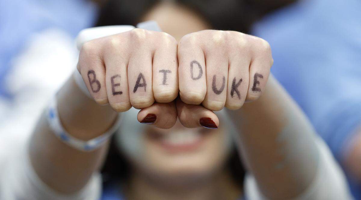 North Carolina senior Katherine Sullivan used her fingers to cheer on the Tar Heels before Duke’s game against UNC at the Dean E. Smith Center in Chapel Hill, N.C., Saturday, Feb. 7, 2026.