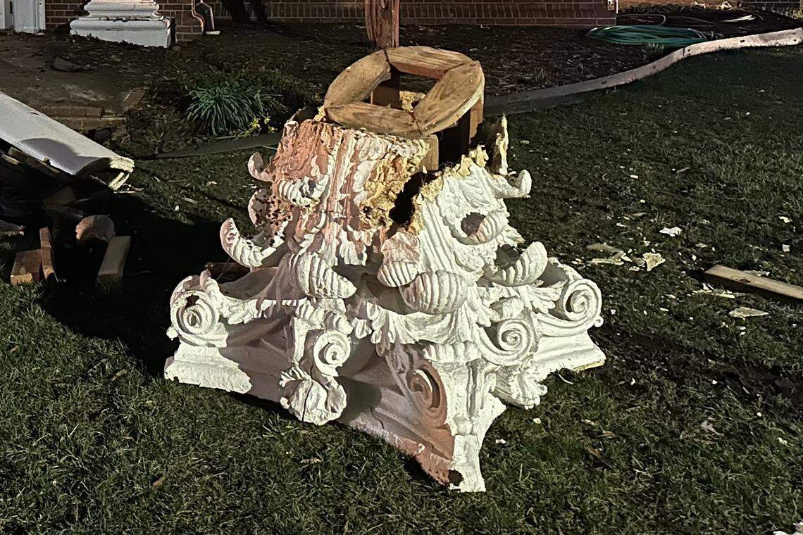 The decorative capital of a column sits on the ground in front of Forest Hills Baptist Church in Raleigh after a car hit the church’s portico on Tuesday evening.