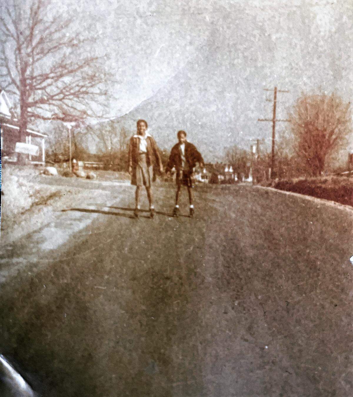 Cousins Dolores Clark and Georgia Bradsher are seen roller skating together in Carrboro, N.C. on Jones Ferry Road.