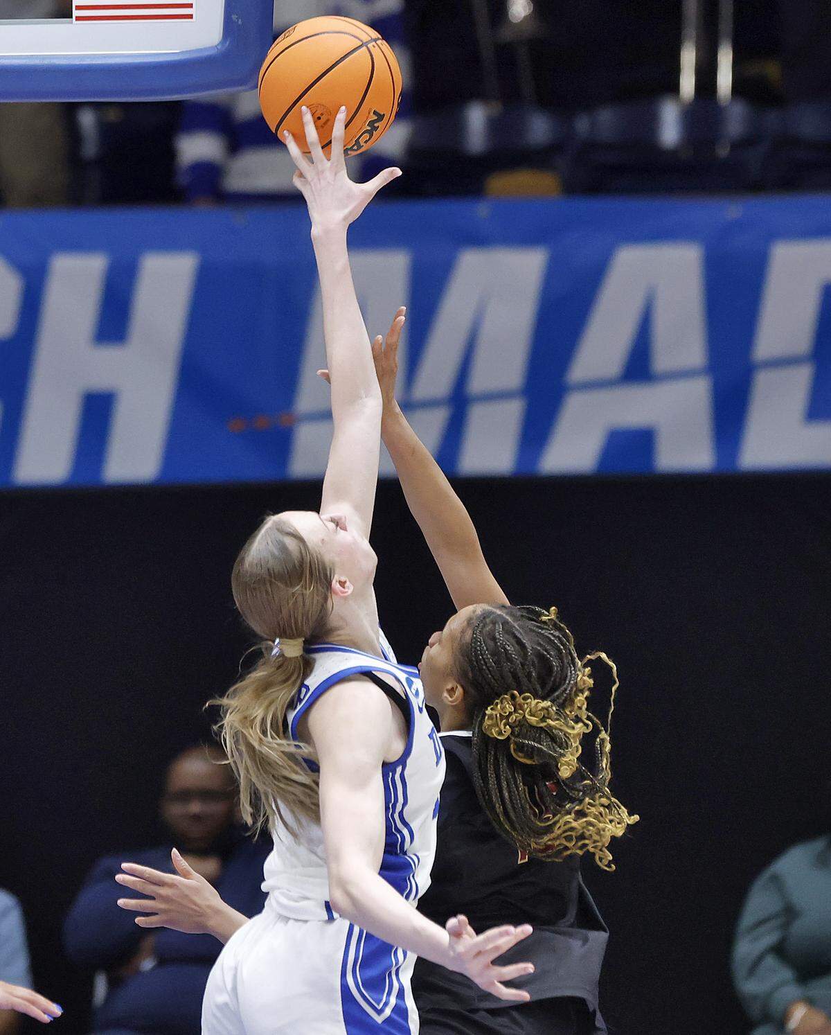 Duke’s Toby Fournier blocks a shot by College of Charleston’s Tyja Beans during the first half of the Blue Devils’ 81-64 first-round NCAA Tournament win on Friday, March 20, 2026, at Cameron Indoor Stadium in Durham, N.C.