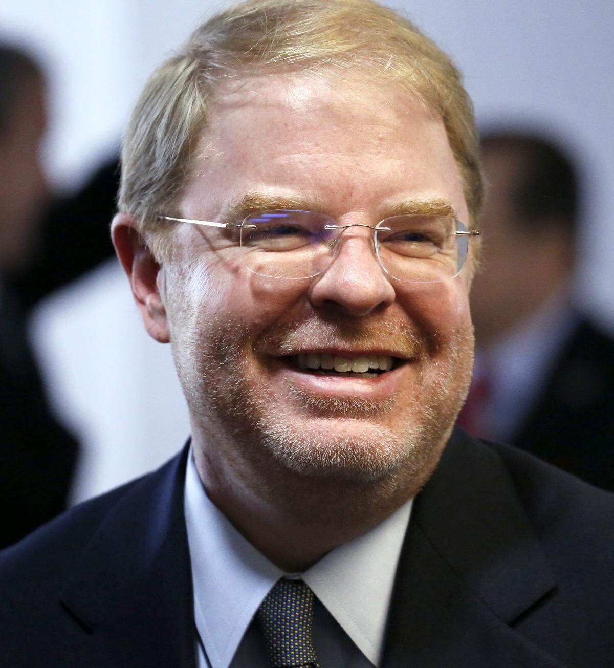 Peter Hans, new President of the NC Community College System, smiles as he is congratulated by well-wishers after the announcement that he was the new head of the system at a press conference at the Community Colleges offices in Raleigh, NC, on Tuesday, May 1, 2018.