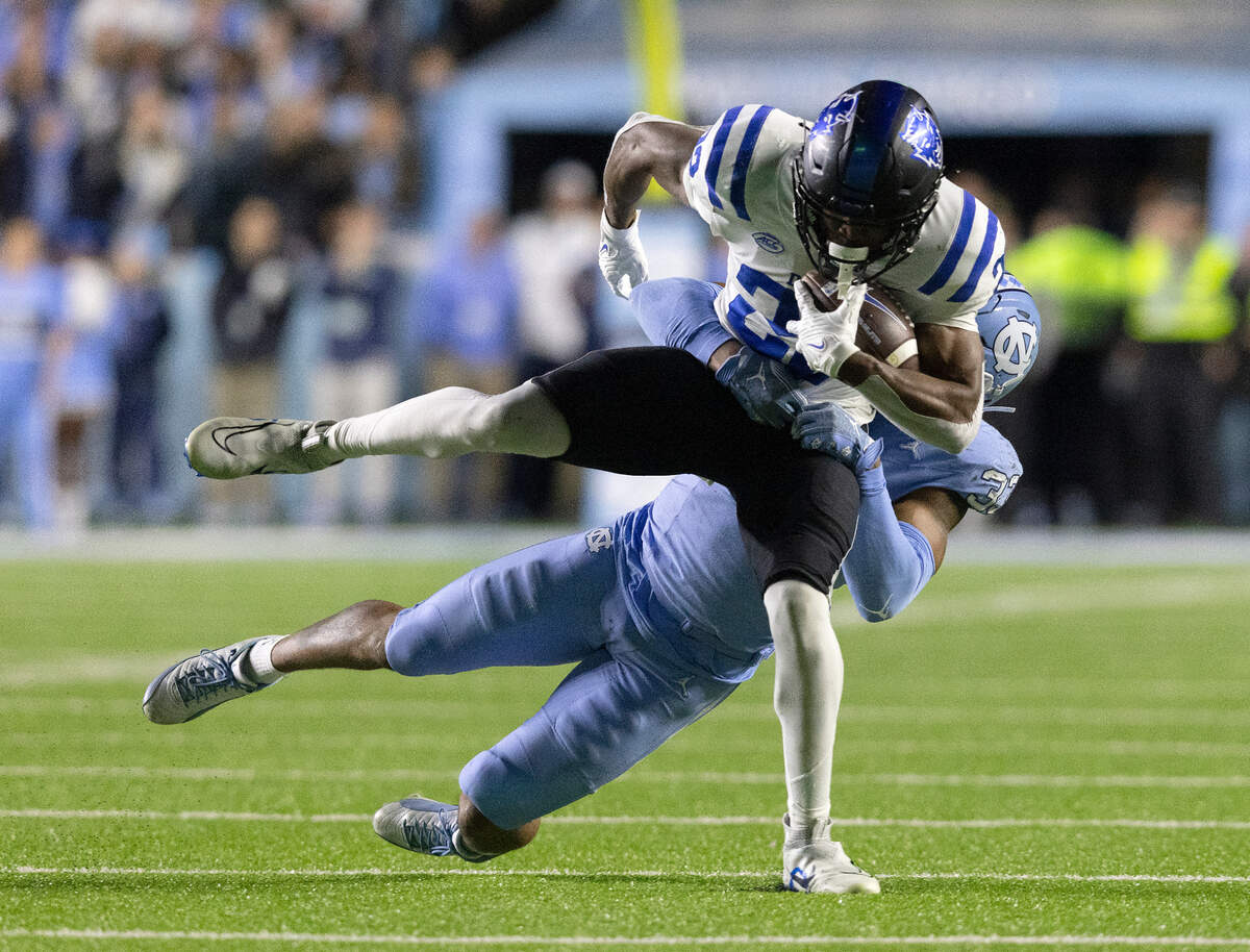 Duke’s Jaylen Coleman is brought down by North Carolina’s Cedric Gray during the second half of the Blue Devils’ 47-45 loss on Saturday, Nov. 11, 2023, at Kenan Stadium in Chapel Hill, N.C.