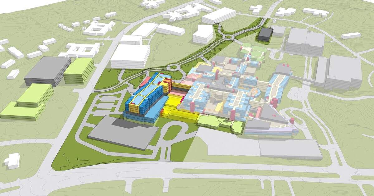 A conceptual rendering of a WakeMed Raleigh campus in the future, with New Bern Avenue running in front. A planned tower in blue, near the corner with Sunnybrook Road, would include a larger emergency department and new operating rooms, intensive care units and heart labs. A relocated Campus Drive would separate WakeMed from Wake Tech Community College’s health sciences campus, top.