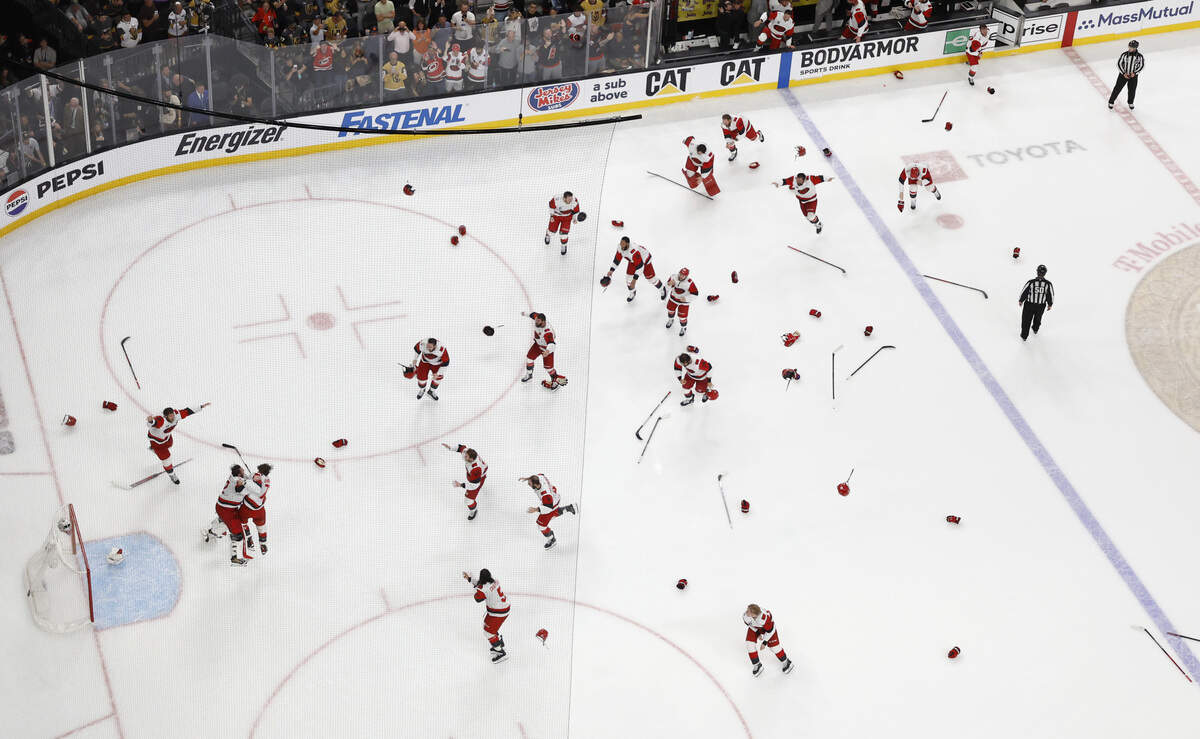 Canes players rush the ice as time expires in the HurricanesÕ 3-0 victory over the Vegas Golden Knights to win the Stanley Cup at T-Mobile Arena in Las Vegas, Nev., Sunday, June 14, 2026.