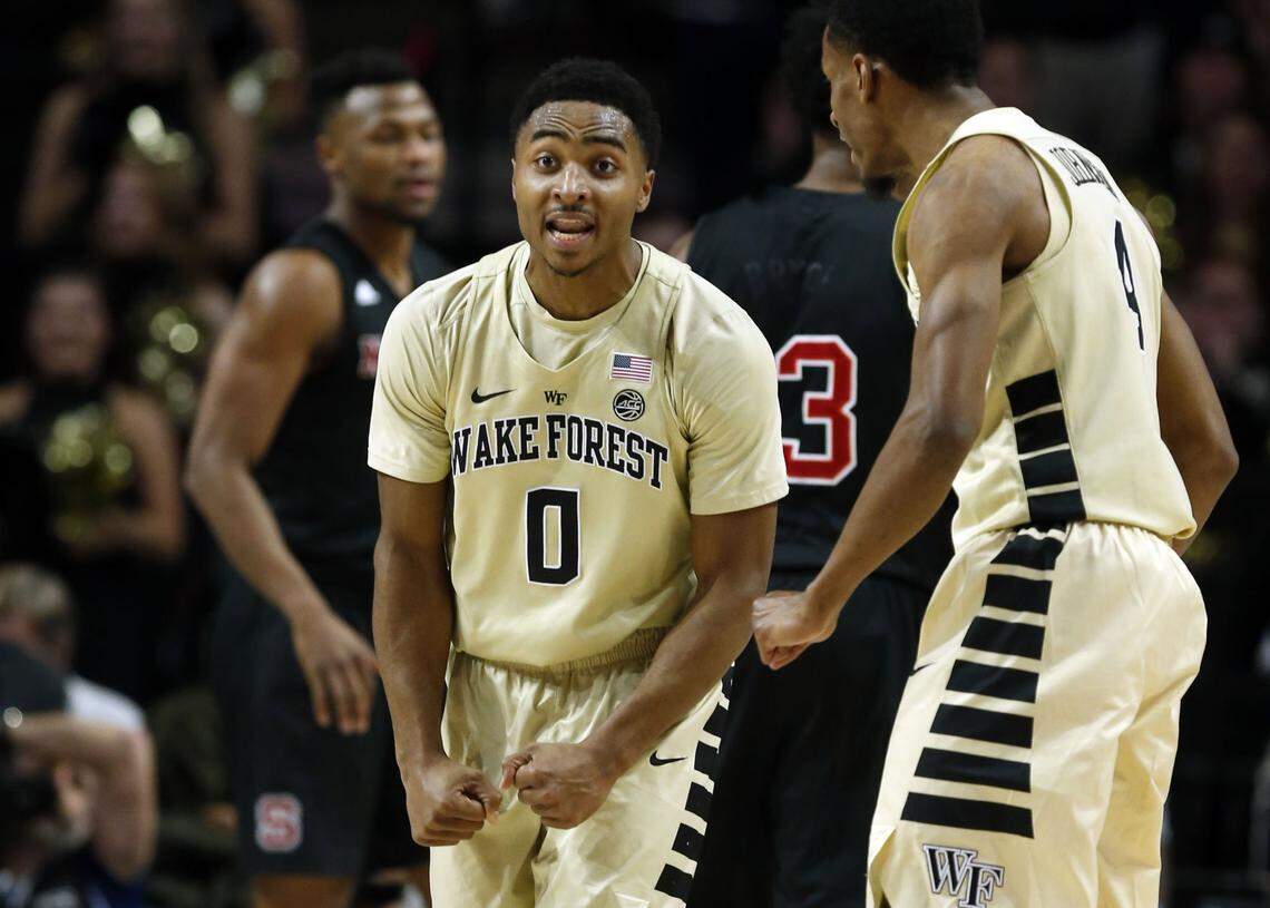 Wake Forest’s Brandon Childress (0) celebrates with Torry Johnson (4) during the first half of N.C. State’s game against Wake Forest at LJVM Coliseum in Winston-Salem, N.C., Tuesday, January 15, 2019.