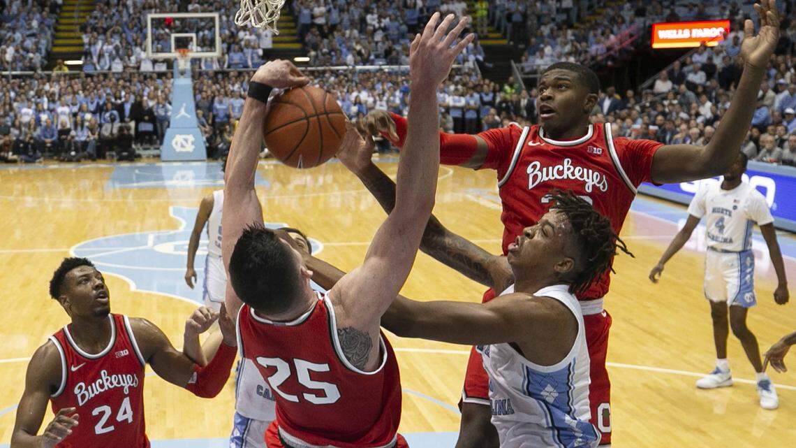 North Carolina’s Armando Bacot (5) battles for a rebound with Ohio State’s Caleb Ellis (25) during the first half on Wednesday, December 4, 2019 at the Smith Center in Chapel Hill, N.C.
