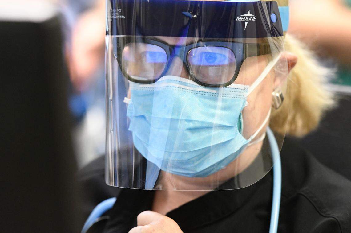 Dr. Eugenia Quackenbush wears PED including a mask and face shield while working in the Emergency Dept. at UNC Hospital June 15, 2020.