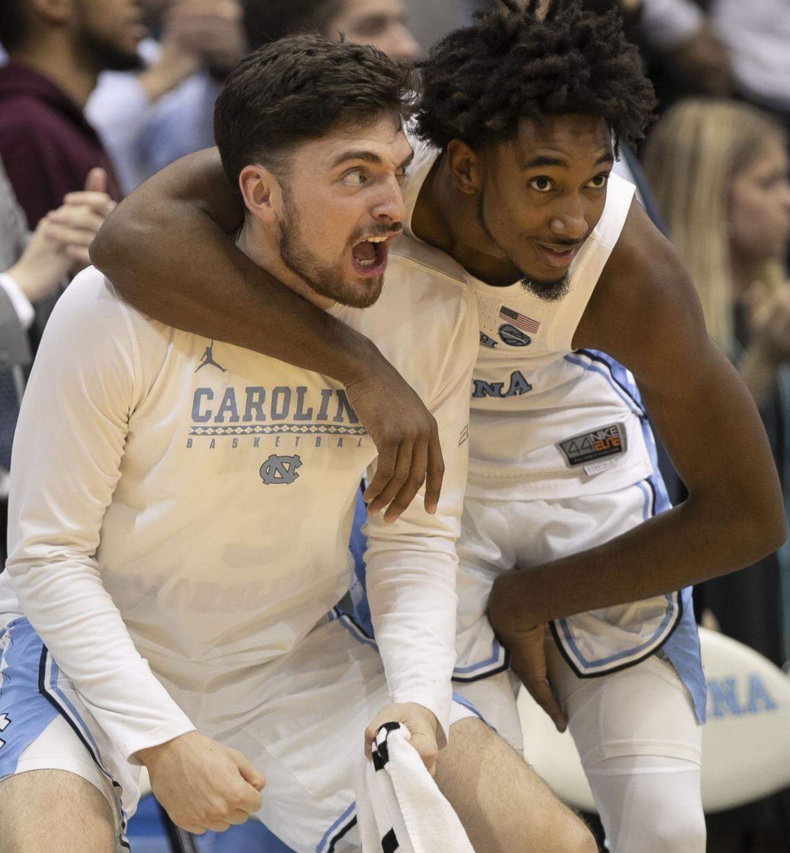 North Carolina’s Andrew Platek (3) and Leaky Black (1) react after a basket by teammate Nassir Little in the second half against Notre Dame on Tuesday, January 15, 2019 at the Smith Center in Chapel Hill, N.C.