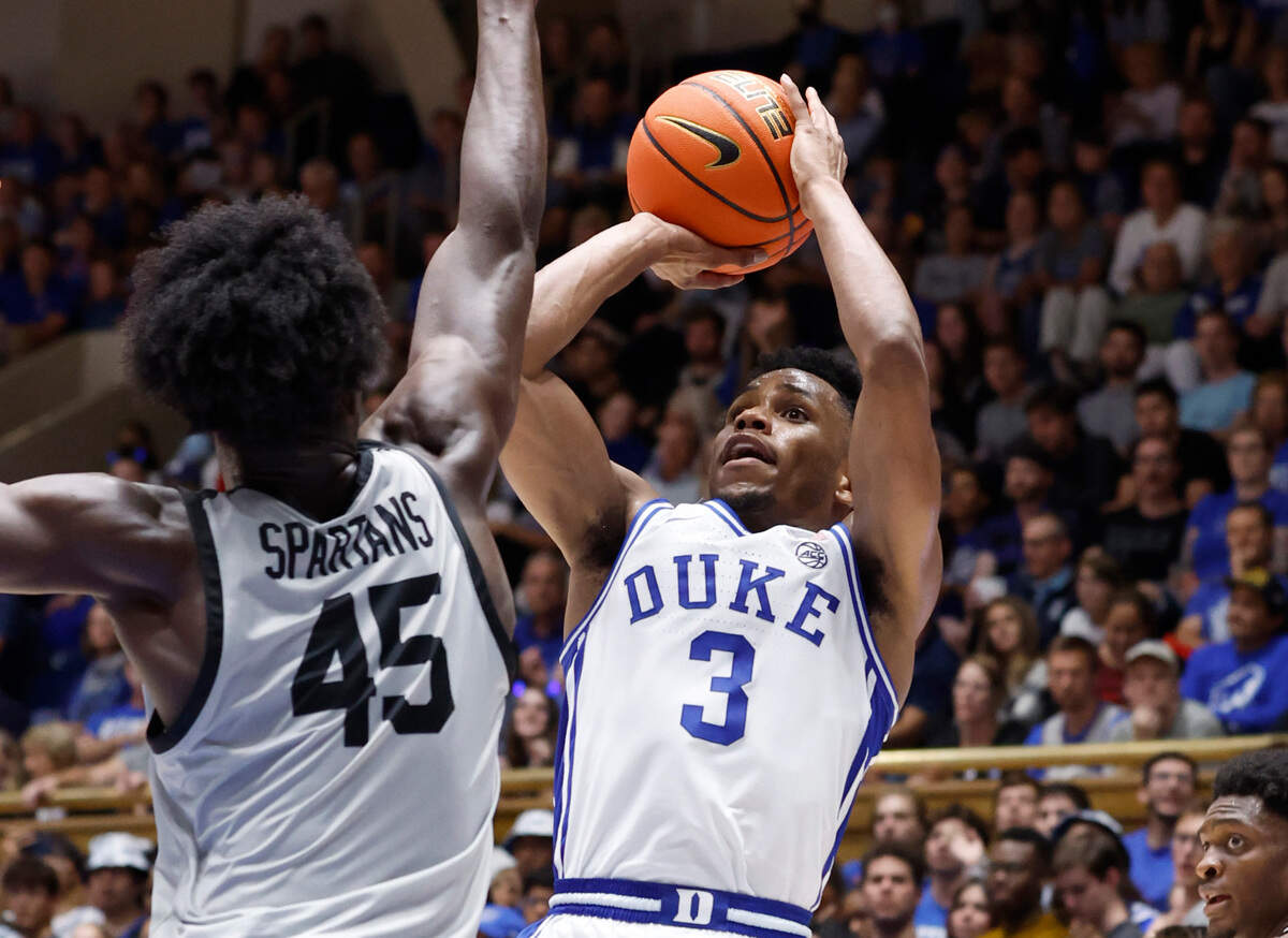Duke’s Jeremy Roach (3) shoots as USC Upstate’s Seny N’Diaye (45) defends during the first half of Duke’s game against USC Upstate at Cameron Indoor Stadium in Durham, N.C., Friday, Nov. 11, 2022.