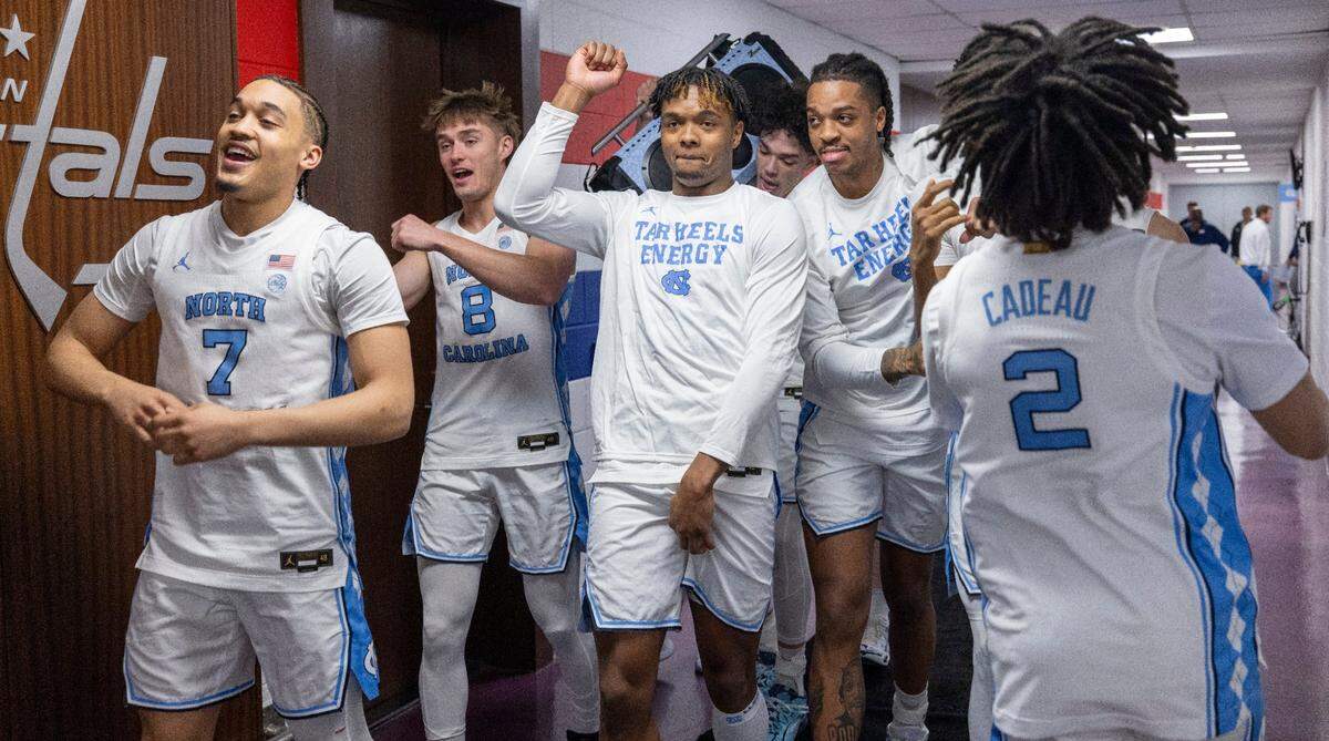North Carolina’s Seth Trimble (7) and Harrison Ingram (55) lead the Tar Heels to the court from their locker room prior to the game against Florida State in the quarterfinals of the ACC Men’s Basketball Tournament at Capitol One Arena on Wednesday, March 13, 2024 in Washington, D.C.