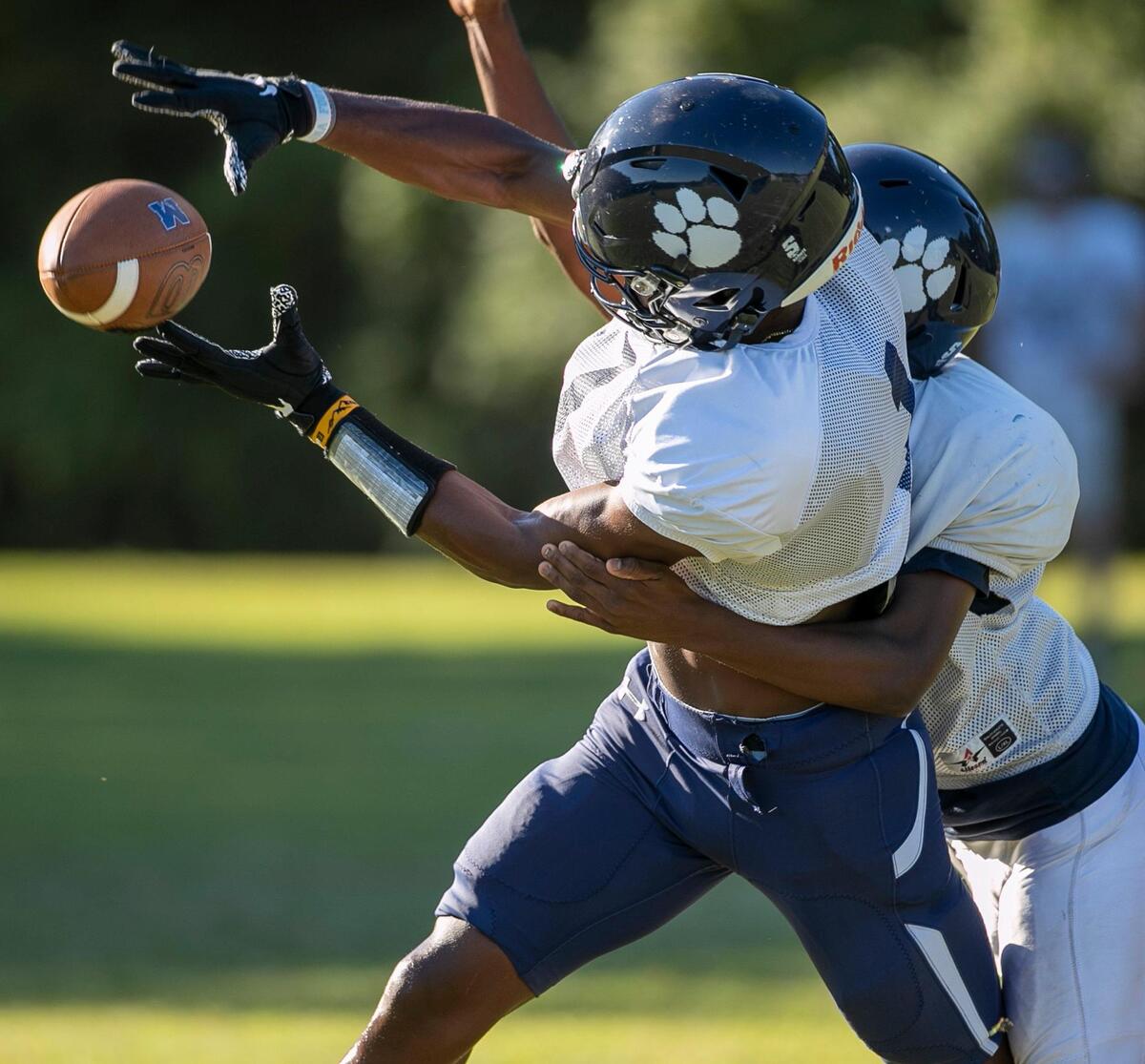 Millbrook High School wide receiver Nathan Leacock goes after a pass during practice on Thursday, August, 31, 2022 in Raleigh, N.C.