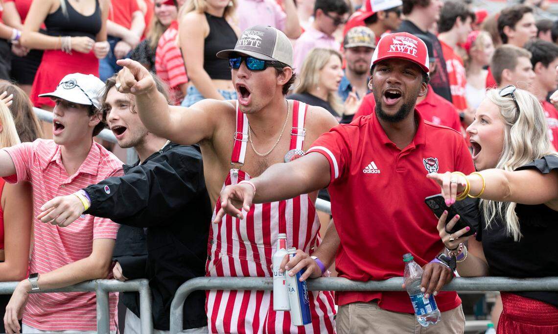 Fans cheer for the Wolfpack before N.C. State’s game against Charleston Southern at Carter-Finley Stadium in Raleigh, N.C., Saturday, Sept. 10, 2022.