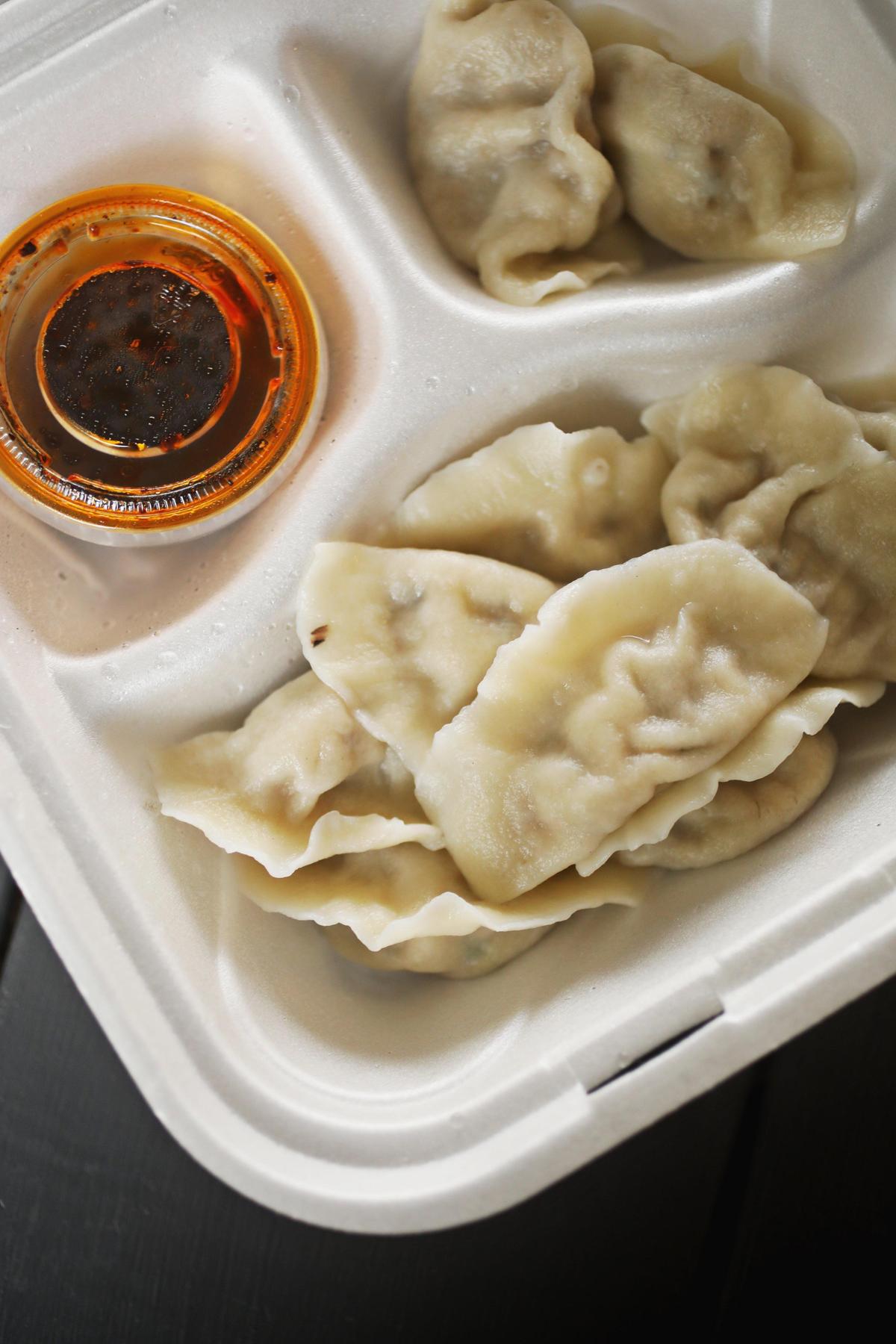 You get 10 dumplings to an order, served with a chile-spiked soy dipping sauce at Sister Liu’s Kitchen in Durham.