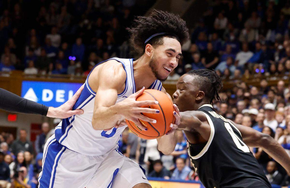 Duke’s Jared McCain (0) drives past Wake Forest’s Kevin Miller (0) during the first half of Duke’s game against Wake Forest at Cameron Indoor Stadium in Durham, N.C., Monday, Feb. 12, 2024.