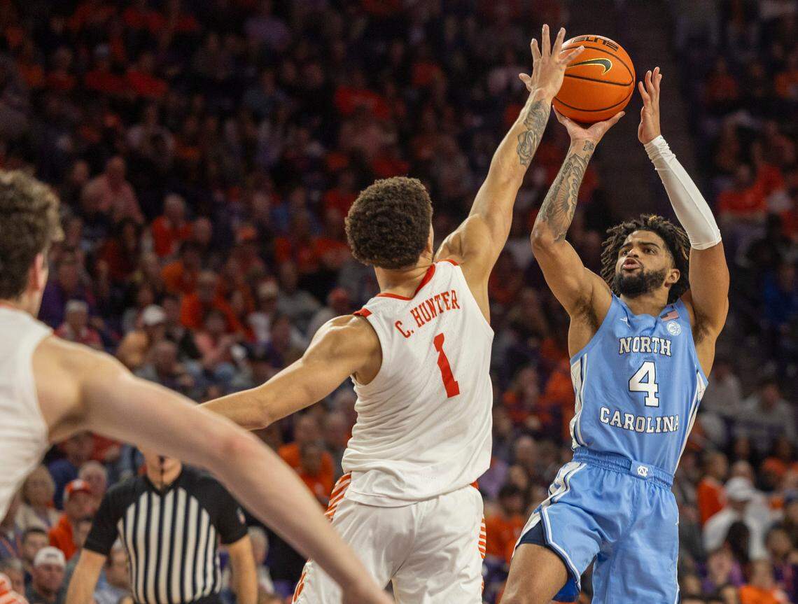 North Carolina’s R.J. Davis (4) puts up a shot against Clemson’s Chase Hunter (1) in the second half on Saturday, January 6, 2024 at Littlejohn Coliseum in Clemson, S.C. Davis and Armando Bacot led North Carolina with 14 points in their 65-55 victory.
