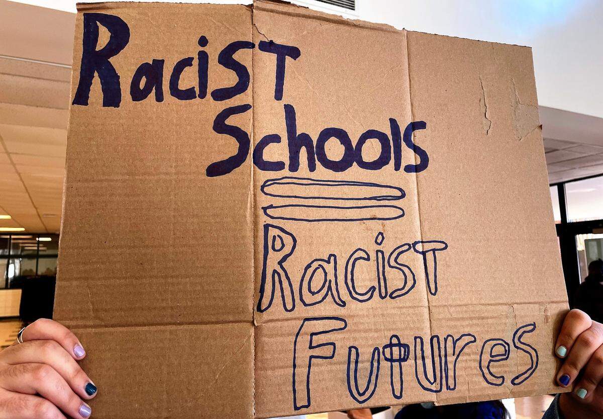 East Chapel Hill High School students, parents and residents asked the CHCCS school board on Dec. 2, 2021, to establish a zero-tolerance policy for racism in the district.