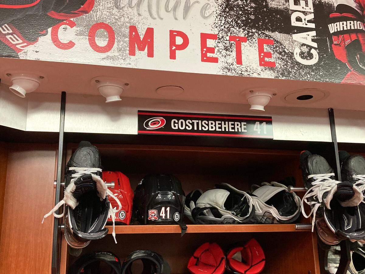 The Carolina Hurricanes locker room at PNC Arena has a new addition for defenseman Shayne Gostisbehere, traded by the Arizona Coyotes to the Hurricanes.