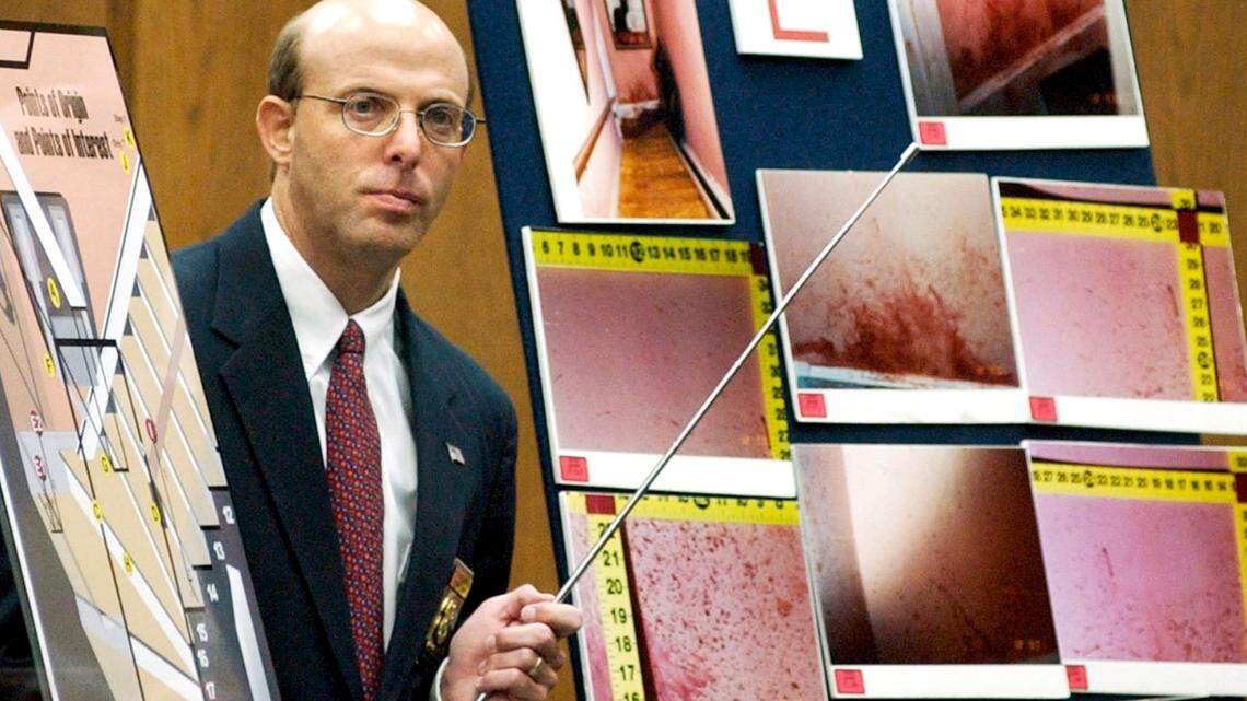 State Bureau of Investigation agent Duane Deaver testifies during Michael Peterson’s murder trial in 2003. Deaver explained how his tests of blood spatters strengthened his opinion that Kathleen Peterson was beaten to death.