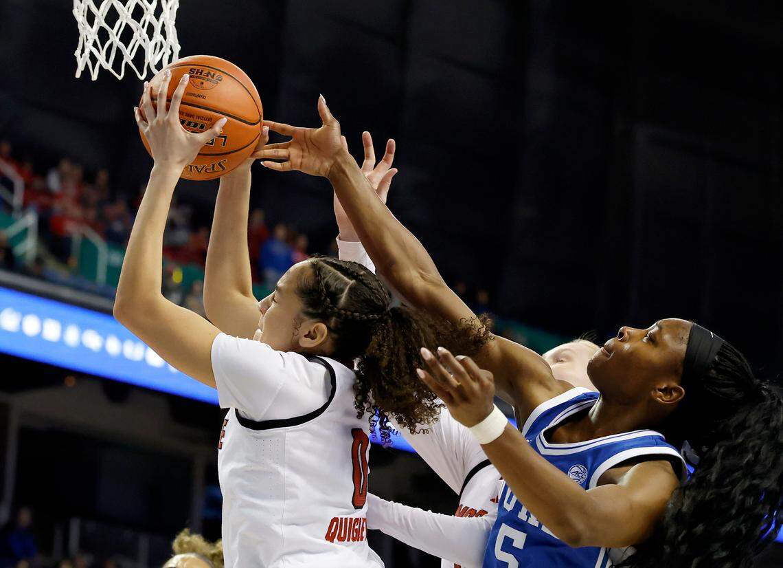 N.C. State’s Devyn Quigley grabs a rebound away from Duke’s Oluchi Okananwa during the second half of the Wolfpack’s 76-62 loss in the ACC Tournament final on Sunday, March 9, 2025, at First Horizon Coliseum in Greensboro, N.C.