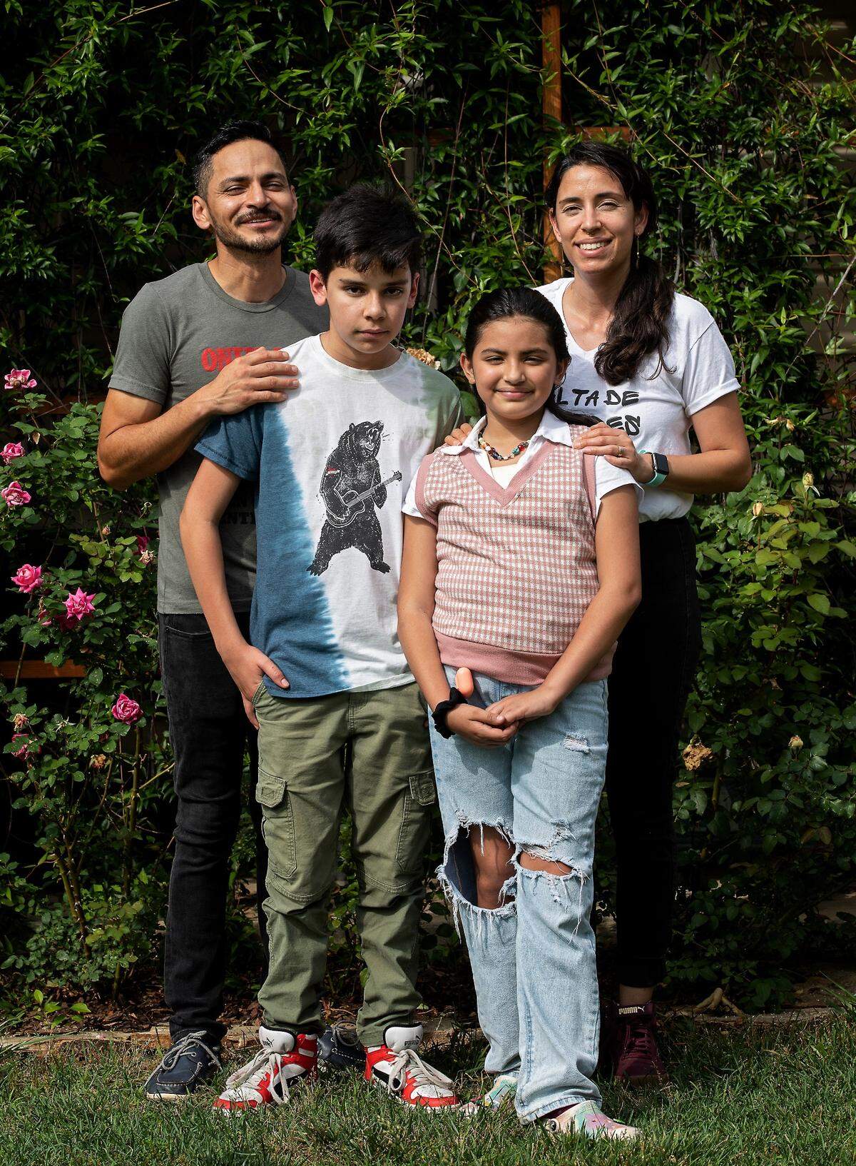 Laura Garduño-García, right, a DACA recipient, is photographed with her husband, Vicente Alvarez, and children Vicente Alvarez-Garduño, 13, and Fernanda Alvarez-Garduño, 10, in Greensboro, N.C. on Thursday, May 26, 2022.