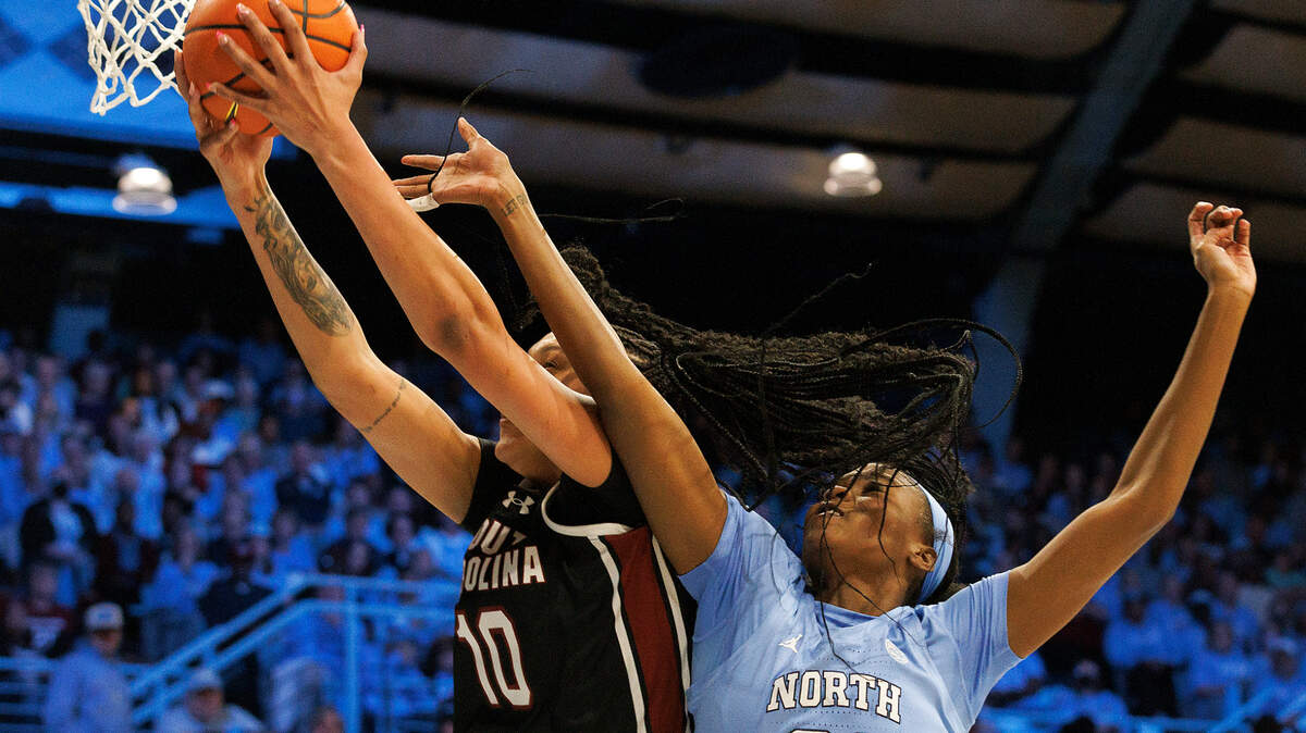 South Carolina’s Kamilla Cardoso grabs a rebound away from North Carolina’s Anya Poole during the first half of the Tar Heels’ game on Thursday, Nov. 30, 2023, at Carmichael Arena in Chapel Hill, N.C.