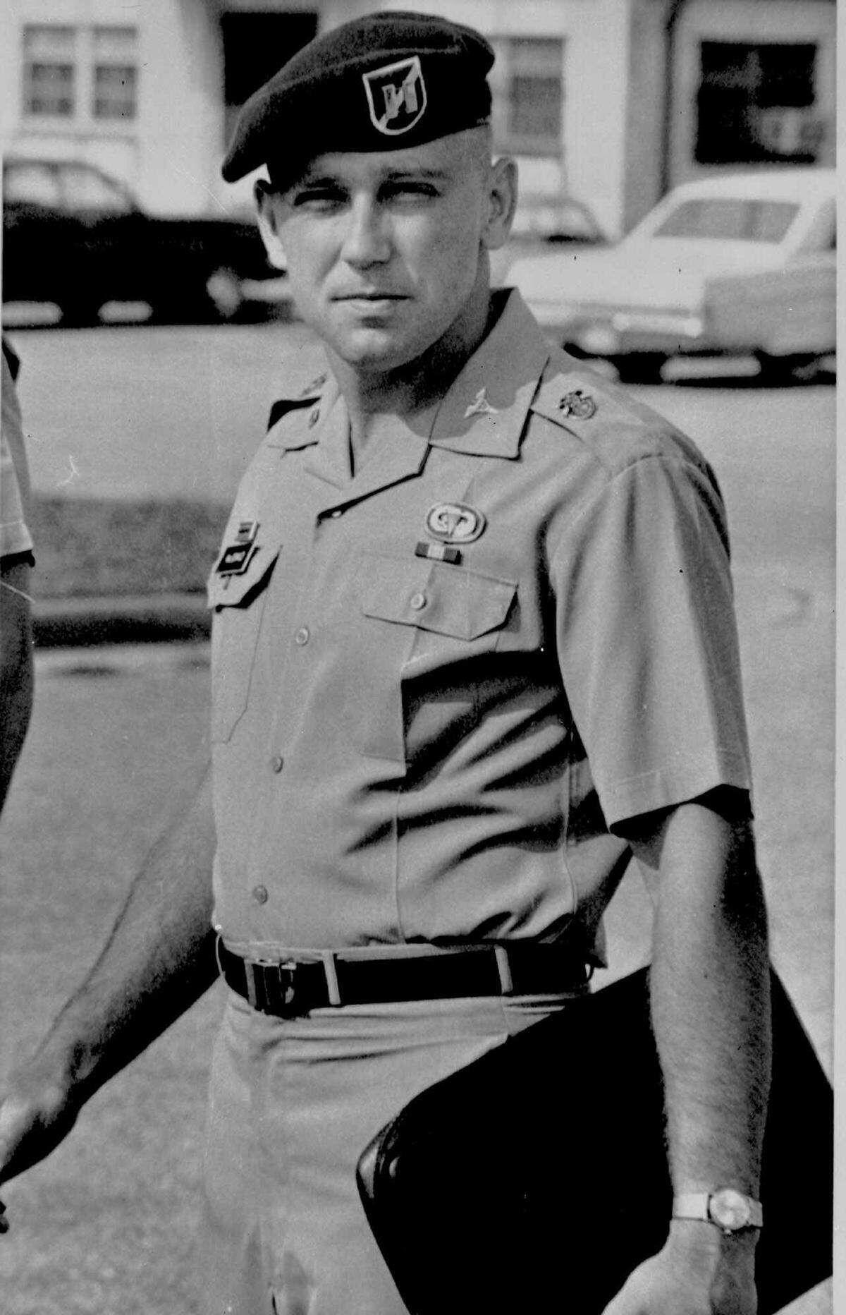 ** FILE ** Capt. Jeffrey MacDonald carries a briefcase before attending a hearing July 7, 1970 on charges against him in a Ft. Bragg, N.C file photo. MacDonald, convicted 25 years ago of the stabbing deaths of his pregnant wife and two daughters, will seek parole but will continue to proclaim his innocence, one of his attorneys said Monday. (AP Photo/File)