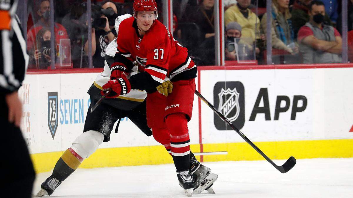 Carolina Hurricanes’ Andrei Svechnikov (37) clears the puck against the Vegas Golden Knights during the third period of an NHL hockey game in Raleigh, N.C., Tuesday, Jan. 25, 2022. (AP Photo/Karl B DeBlaker)