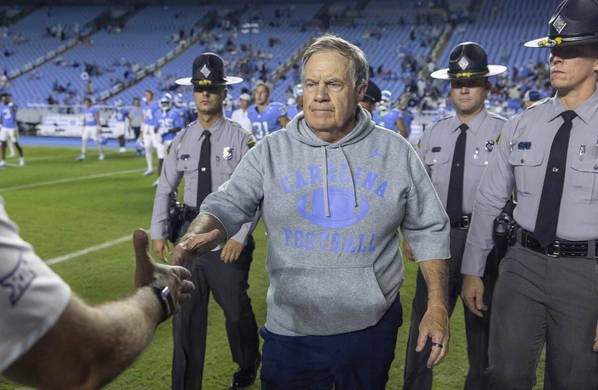 North Carolina coach Bill Belichick congratulates Texas Christian University head coach Sonny Dykes following the Horned Frogs’ 48-14 victory on Monday, September 1, 2025 at Kenan Stadium in Chapel Hill, N.C. 