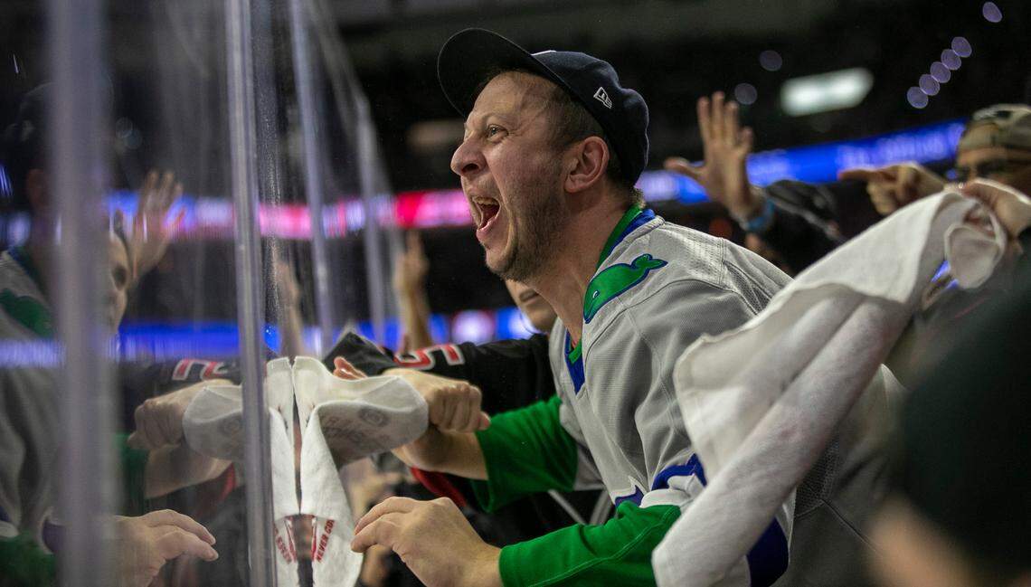 Carolina Hurricanes fans harass Florida Panthers Radko Gudas (7) as he heads to the penalty box for tripping in the third period during Game 2 of the Eastern Conference Finals on Saturday, May 20, 2023 at PNC Arena in Raleigh, N.C.