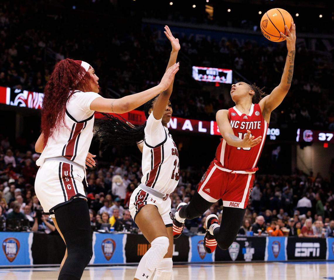 N.C. State’s Aziaha James puts up a shot over South Carolina’s Bree Hall during the second half of the Wolfpack’s 78-59 Final Four loss to South Carolina at Rocket Mortgage FieldHouse on Friday, April 5, 2024, in Cleveland, Ohio.