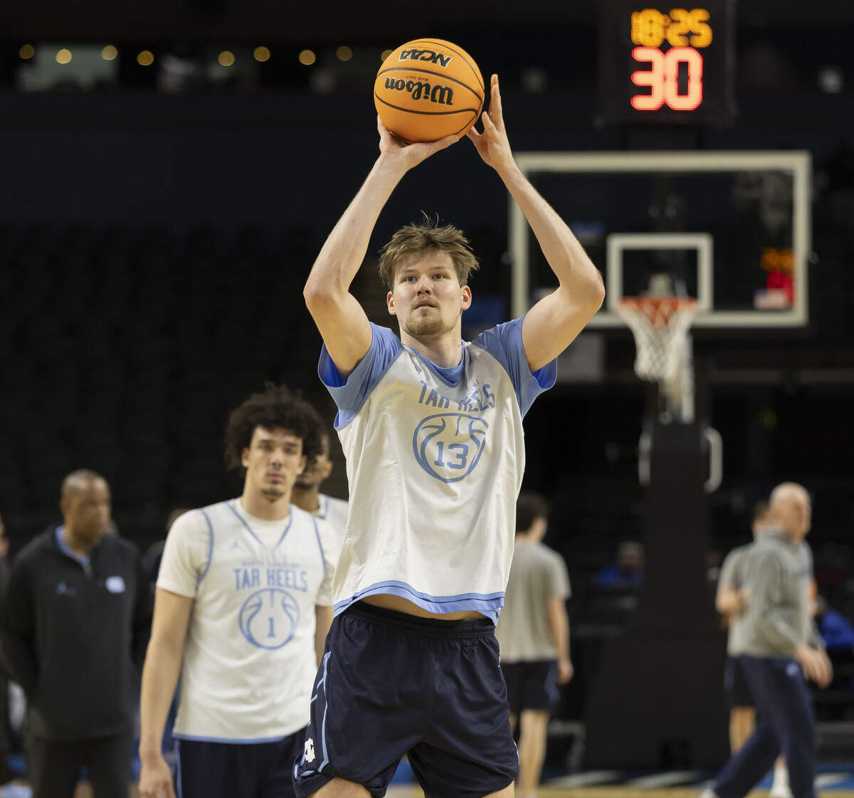 North Carolina center Henri Veesaar (13) works his three-point shot during the Tar Heels’ practice on Wednesday, March 18, 2026, at Bon Secours Arena in Greenville, S.C.