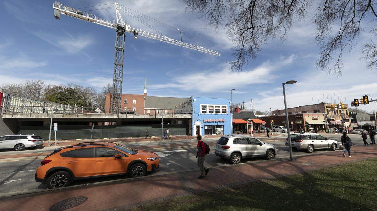 The crane than has towered over a stalled apartment project for several years on Hillsborough Street in Raleigh is scheduled to be taken down in March 2019. The crane was erected in 2015 to build the Hillsborough Lofts, but a legal dispute stalled the project.