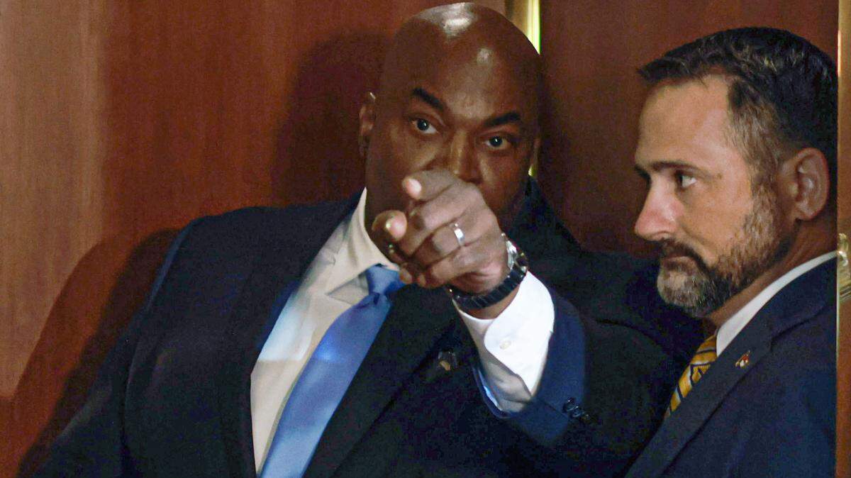 North Carolina Lt. Gov. Mark Robinson lashes out at the news media on Wednesday, July 10, 2024 from an elevator in the General Assembly. On the right is Robinson’s then-Chief of Staff Brian LiVecchi, who resigned in September 2024.
