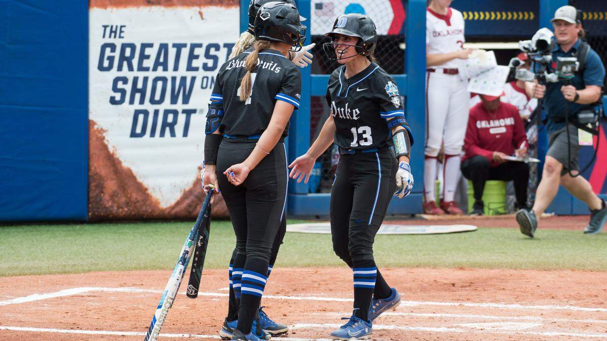 Duke Blue Devils catcher Francesca Frelick (13) celebrates at the plate after hitting a home run in the second inning against the Oklahoma Sooners during a Women’s College World Series softball game at Devon Park.