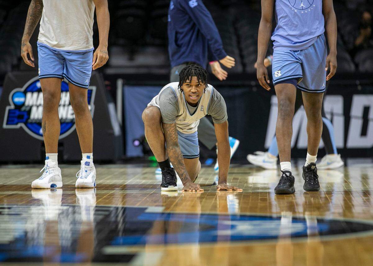 North Carolinas Caleb Love (2) stretches during the Tar Heels open practice on Thursday, March 24, 2022 at Wells Fargo Center in Philadelphia, Pa.