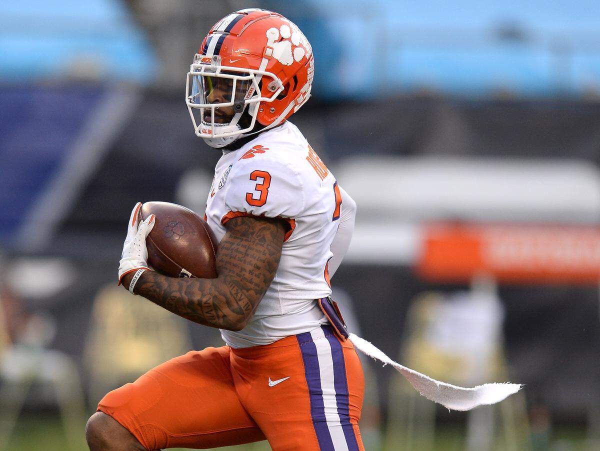 Clemson Tigers wide receiver Amari Rodgers races toward the end zone following a deep pass reception from quarterback Trevor Lawrence during first quarter action against Notre Dame at Bank of America Stadium on Saturday, December 19, 2020 in Charlotte, NC. The Clemson Tigers and Notre Dame Fighting Irish faced off in the ACC Championship game.